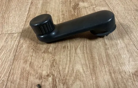 Renault Trafic II (X83) Front door window winding handle 7700811387