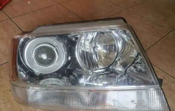 Jeep Grand Cherokee (WJ) Headlight/headlamp 61B50050092 61b50050093
