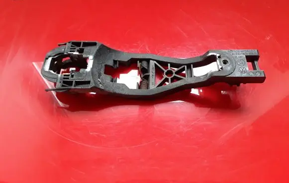 Rear door exterior handle/bracket