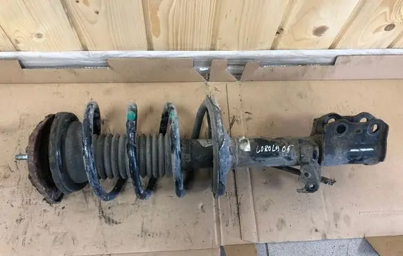 Toyota Corolla E120 E130 Front shock absorber with coil spring