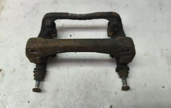 Renault Kangoo II Brake caliper pad carrier rear 