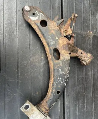Subaru Justy Rear suspension control arm 