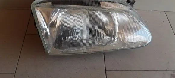 Renault Scenic I Headlight/headlamp 7700831463