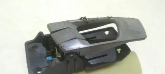 KIA Carens I Front door interior handle