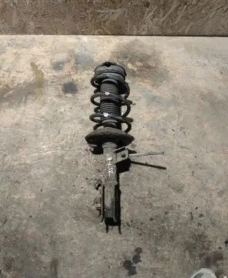 Nissan X-Trail T31 Front shock absorber with coil spring 