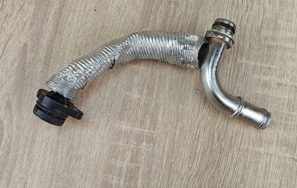 Audi A5 Coolant pipe/hose 06L121497AA