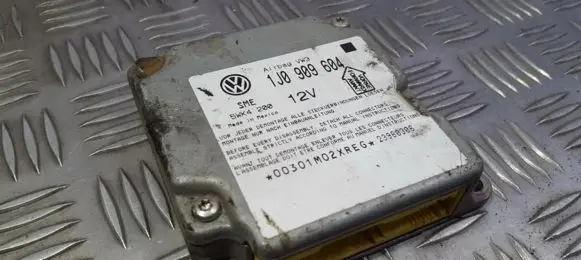Volkswagen PASSAT B5 Airbag control unit/module 1J0909604 5WK4200