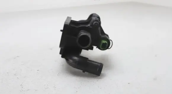 Thermostat/thermostat housing