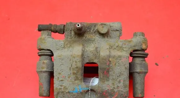 Mitsubishi Lancer VIII Rear brake caliper