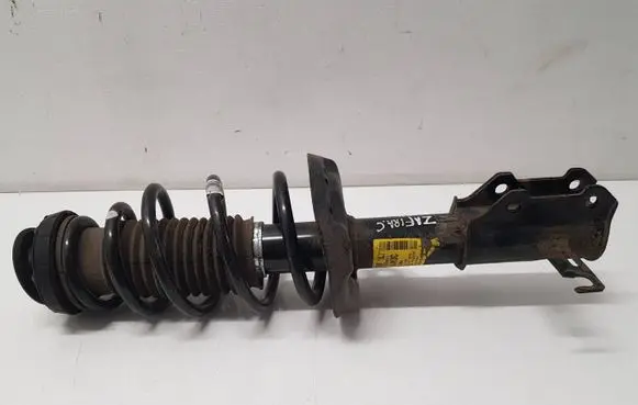 Opel Zafira C Front shock absorber with coil spring 13338917