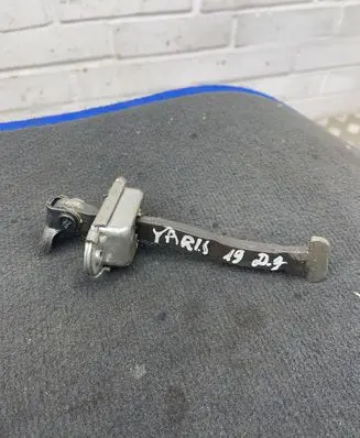 Toyota Yaris Rear door check strap stopper