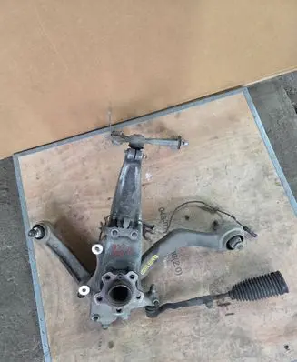 Front wheel hub spindle knuckle