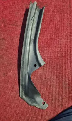 Engine bonnet/hood lock trim molding