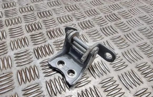 Front door lower hinge