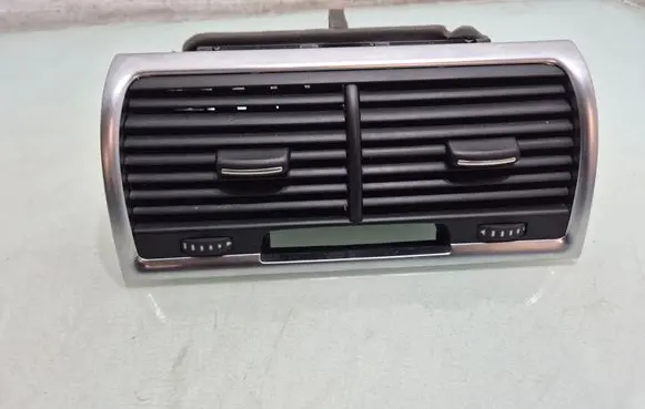 Dash center air vent grill