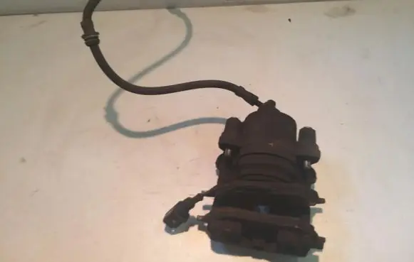 Volkswagen Golf V Front brake caliper