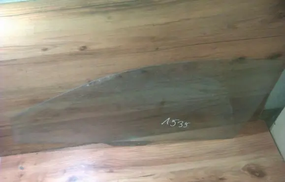Mazda 323 Front door window glass four-door