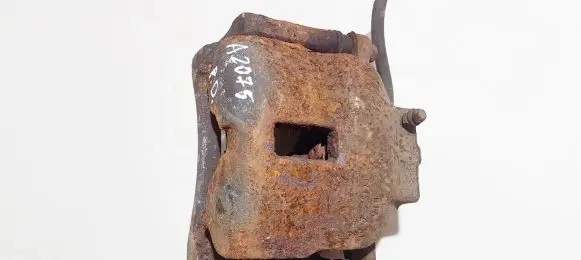 Nissan Almera N16 Front brake caliper