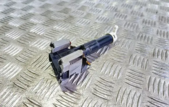 Headlight washer spray nozzle