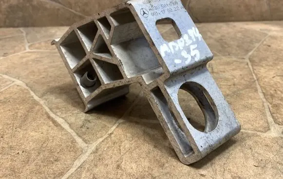 Radiator support slam panel bracket