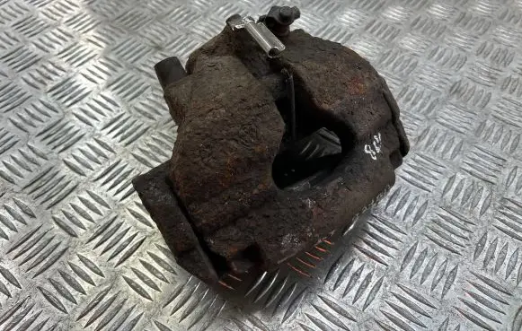 Volkswagen Touareg I Front brake caliper