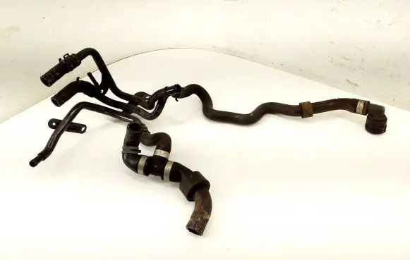 Skoda Octavia Mk3 (5E) Engine coolant pipe/hose 04L121064AD 5Q0122101BE