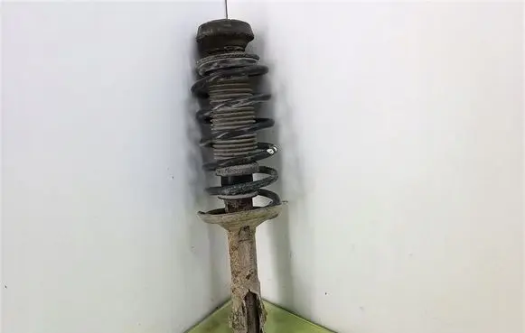 Volkswagen Caddy Front shock absorber with coil spring 6K0413031G