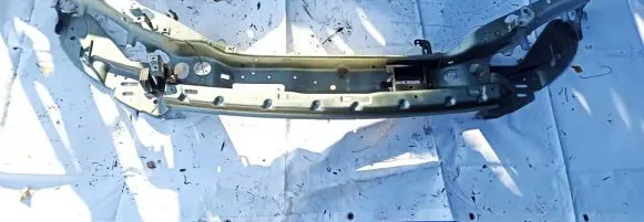 Radiator support slam panel