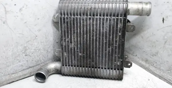 KIA Carens I Intercooler radiator 2827127350