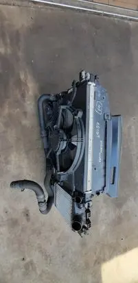 Radiator support slam panel