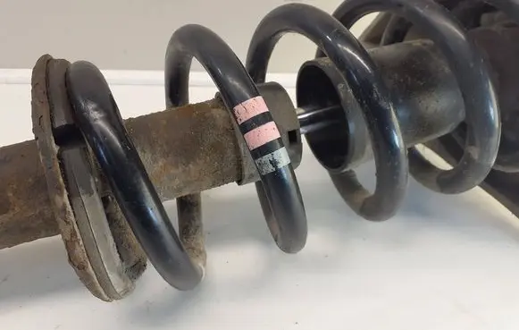 Front shock absorber with coil spring