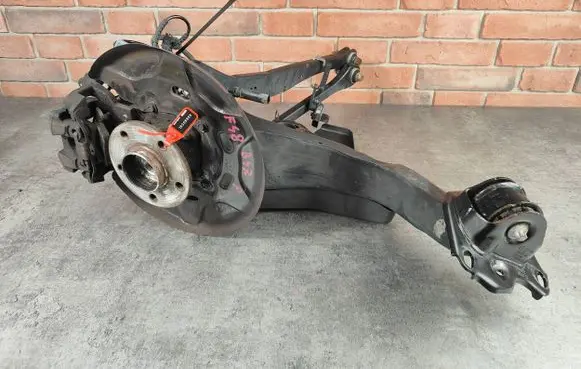 Rear wheel hub spindle/knuckle