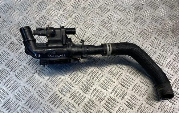 Thermostat/thermostat housing