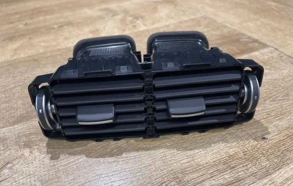Jaguar XE Rear air vent grill GJ32014A22AA GX63014A22AB