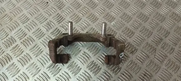 Volkswagen PASSAT B6 Brake caliper pad carrier rear 