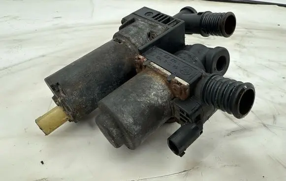 Coolant heater control valve