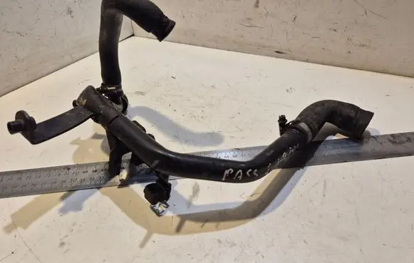 Volkswagen PASSAT B5 Engine coolant pipe/hose 028121065AD