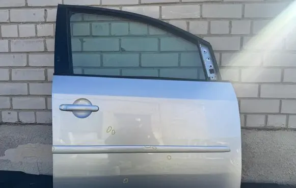 Volkswagen Touran II Front door 