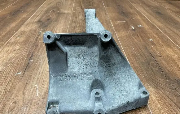 Mercedes-Benz E W124 A/C compressor mount bracket 1264660641