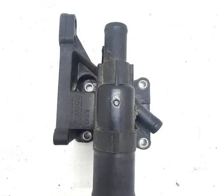 Thermostat/thermostat housing