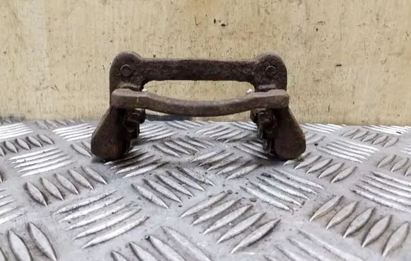 Toyota Corolla E120 E130 Brake caliper pad carrier rear 