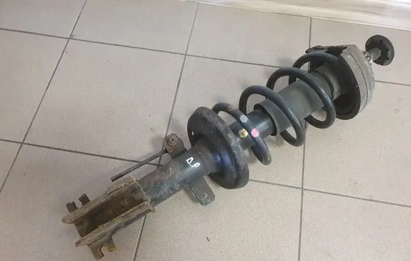Opel Vivaro Front shock absorber with coil spring