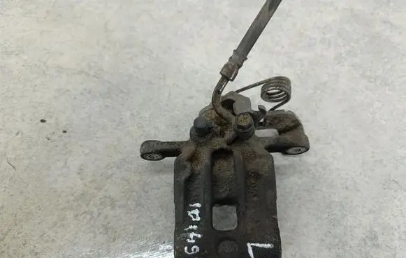 KIA Carens III Rear brake caliper 
