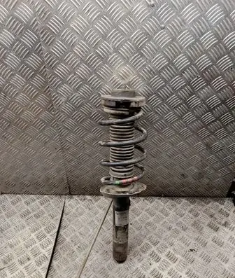 Volkswagen Caddy Front shock absorber with coil spring