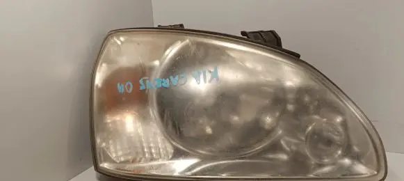 KIA Carens II Headlight/headlamp OK2FA51020