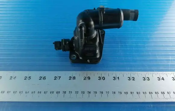 Thermostat/thermostat housing