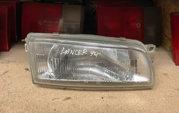 Mitsubishi Lancer Headlight/headlamp 00117027 7026