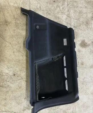 Trunk/boot lower side trim panel