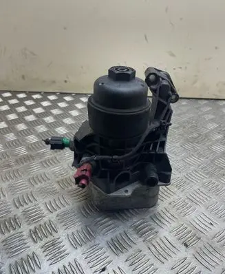 Volkswagen Jetta VI Oil filter mounting bracket 03N117021