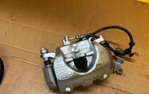 Land Rover Defender Front brake caliper N934BCNYCA